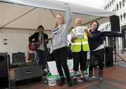 15 April 2011; Special Olympics collector Rita Lawlor, member of Council of Patrons Special Olympics Ireland, with Aine Flanagan, left, and Rebecca Blake, from Killiney, dance along to Musician Darragh Cullen, during the Special Olympics Ireland’s annual collection day. This is the biggest annual fundraising event in aid of Special Olympics Ireland. Grafton Street, Dublin. Picture credit: Brian Lawless / SPORTSFILE