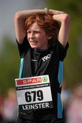 10 April 2011; Evan Cooper, from Rathmines, Dublin, following the Junior event at the SPAR Great Ireland Run 2011. Phoenix Park, Dublin. Picture credit: Stephen McCarthy / SPORTSFILE