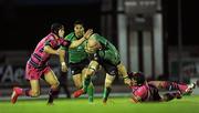 15 April 2011; Johnny O'Connor, Connacht, is tackled by Leigh Halfpenny, left, and Jamie Roberts, right, Cardiff Blues. Celtic League, Connacht v Cardiff Blues, Sportsground, Galway. Picture credit: Barry Cregg / SPORTSFILE
