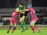 15 April 2011; Mike McCarthy, Connacht, is tackled by Gareth Williams, left, and Michael Paterson, Cardiff Blues. Celtic League, Connacht v Cardiff Blues, Sportsground, Galway. Picture credit: Barry Cregg / SPORTSFILE