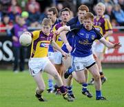 16 April 2011; Michael Furlong, Wexford, in action against Jack Brady, Cavan. Cadbury GAA All-Ireland Football U21 Championship Semi-Final, Cavan v Wexford, Parnell Park, Dublin. Picture credit: Matt Browne / SPORTSFILE