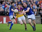 16 April 2011; Fergal Flanagan, Cavan, in action against Paudie Kelly, Wexford. Cadbury GAA All-Ireland Football U21 Championship Semi-Final, Cavan v Wexford, Parnell Park, Dublin. Picture credit: Barry Cregg / SPORTSFILE