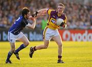 16 April 2011; Matthew O'Hanlon, Wexford, in action against Mark Leddy, Cavan. Cadbury GAA All-Ireland Football U21 Championship Semi-Final, Cavan v Wexford, Parnell Park, Dublin. Picture credit: Matt Browne / SPORTSFILE