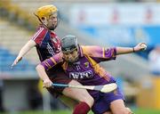 17 April 2011; Ursula Jacob, Wexford, in action against Sarah Dervan, Galway. Irish Daily Star Camogie League, Division 1, Final, Galway v Wexford, Semple Stadium, Thurles, Co. Tipperary. Picture credit: Brian Lawless / SPORTSFILE