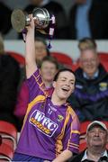 17 April 2011; Ursula Jacob, Wexford, lifts the cup. Irish Daily Star Camogie League, Division 1, Final, Galway v Wexford, Semple Stadium, Thurles, Co. Tipperary. Picture credit: Brian Lawless / SPORTSFILE