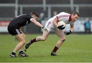 27 November 2016; Patsy Bradley of Slaughtneil in action against Aaron Branagan of Kilcoo during the AIB Ulster GAA Football Senior Club Championship Final game between Slaughtneil and Kilcoo at the Athletic Grounds in Armagh. Photo by Oliver McVeigh/Sportsfile
