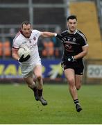27 November 2016; Patsy Bradley of Slaughtneil in action against James McClean of Kilcoo during the AIB Ulster GAA Football Senior Club Championship Final game between Slaughtneil and Kilcoo at the Athletic Grounds in Armagh. Photo by Oliver McVeigh/Sportsfile