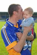 17 April 2011; Wicklow corner-forward Enan Glynn celebrates with his six month old son Enan, same name. Allianz GAA Hurling Division 3A Final, Wicklow v Derry, Pearse Park, Longford. Picture credit: Ray McManus / SPORTSFILE