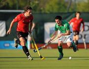 17 April 2011; Alan Giles, Ireland, in action against Jesse David Jameson, Canada. Men's Hockey Test Series, Ireland v Canada, National Hockey Stadium, UCD, Belfield, Dublin. Picture credit: Barry Cregg / SPORTSFILE