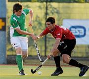 17 April 2011; Shane O'Donoghue, Ireland, in action against Adam Froese, Canada. Men's Hockey Test Series, Ireland v Canada, National Hockey Stadium, UCD, Belfield, Dublin. Picture credit: Barry Cregg / SPORTSFILE