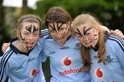 18 April 2011; Kilmacud Crokes team members Aideen Herlihy, Rachel Flemming and Lucy O'Connor after receiving 'Haka' lessons from All Black legend and Laureus Sport for Good Foundation goodwill ambassador Sean Fitzpatrick. Kilmacud Crokes GAA Club, Stillorgan, Co. Dublin. Picture credit: Stephen McCarthy / SPORTSFILE