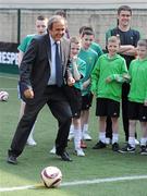 19 April 2011; UEFA President Michel Platini prepares to score a goal, from the penalty spot, during his visit to see the Hardwicke F.C. facilities and the Football for All Programme while in Dublin for the UEFA Europa League Trophy Handover in advance of the UEFA Europa League final, to be played at the Aviva Stadium on Wednesday 18 May. Hardwicke Street, Dublin. Picture credit: Ray McManus / SPORTSFILE