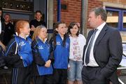 19 April 2011; Former Republic of Ireland international Ray Houghton chatting to Hardwicke  F.C. club members Sophie Perry, Abbie Smyth, Ally O'Toole and Chloe Brennan as they await the arrival of the UEFA President, Michel Platini, who visited the club's facilities and the Football for All Programme while in Dublin for the UEFA Europa League Trophy Handover in advance of the UEFA Europa League final, to be played at the Aviva Stadium on Wednesday 18 May. Hardwicke Street, Dublin. Picture credit: Ray McManus / SPORTSFILE
