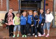 19 April 2011; Hardwicke Football Club children, from left, Alana Kennedy, Bobbi Browne, Teegan Hanney, Sophie Perry, Abbie Smyth, Ally O'Toole and Chloe Brennan strike a pose as they await the arrival of the UEFA President, Michel Platini, who visited the club's facilities and the Football for All Programme while in Dublin for the UEFA Europa League Trophy Handover in advance of the UEFA Europa League final, to be played at the Aviva Stadium on Wednesday 18 May. Hardwicke Street, Dublin. Picture credit: Ray McManus / SPORTSFILE