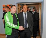 19 April 2011; UEFA President Michel Platini with Anto Reilly, Hardwicke F.C. when the UEFA President visited the club's facilities and the Football for All Programme while in Dublin for the UEFA Europa League Trophy Handover in advance of the UEFA Europa League final, to be played at the Aviva Stadium on Wednesday 18 May. Hardwicke Street, Dublin. Picture credit: Ray McManus / SPORTSFILE