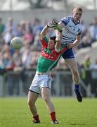 10 April 2011; Enda Varley, Mayo, in action against Colin Walshe, Monaghan. Allianz Football League, Division 1, Round 7, Monaghan v Mayo, Inniskeen, Co. Monaghan. Picture credit: Brian Lawless / SPORTSFILE