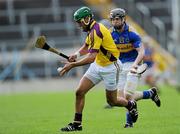 17 April 2011; Keith Rossiter, Wexford, in action against Gearoid Ryan, Tipperary. Allianz Hurling League, Division 1, Round 7, Tipperary v Wexford, Semple Stadium, Thurles, Co. Tipperary. Picture credit: Brian Lawless / SPORTSFILE