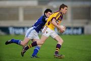 16 April 2011; Kevin O'Grady, Wexford, in action against Darragh Tighe, Cavan. Cadbury GAA All-Ireland Football U21 Championship Semi-Final, Cavan v Wexford, Parnell Park, Dublin. Picture credit: Barry Cregg / SPORTSFILE