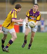 16 April 2011; Declan Murphy, right, Wexford, passes the ball to team-mate Kevin O'Grady. Cadbury GAA All-Ireland Football U21 Championship Semi-Final, Cavan v Wexford, Parnell Park, Dublin. Picture credit: Barry Cregg / SPORTSFILE