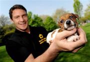 20 April 2011; Pictured at the launch of the 2011 Pedigree Adoption Drive is dog lover, Munster and Ireland rugby star David Wallace, with his friend Tia, a Jack Russell pup, from the ISPCA. 45 dogs are abandoned in Ireland every day, 17 dogs are put to sleep. In order to help curb these startling figures, Pedigree has teamed up David and Aoibhinn for the 2011 Annual Pedigree Adoption Drive. St. Stephen's Green, Dublin. Picture credit: Brian Lawless / SPORTSFILE