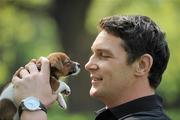 20 April 2011; Pictured at the launch of the 2011 Pedigree Adoption Drive is dog lover, Munster and Ireland rugby star David Wallace, with his friend Tia, a Jack Russell pup, from the ISPCA. 45 dogs are abandoned in Ireland every day, 17 dogs are put to sleep. In order to help curb these startling figures, Pedigree has teamed up David and Aoibhinn for the 2011 Annual Pedigree Adoption Drive. St. Stephen's Green, Dublin. Picture credit: Brian Lawless / SPORTSFILE