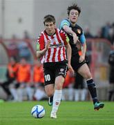 22 April 2011; Patrick McEleney, Derry City, in action against Shane McFaul, St Patrick's Athletic. Airtricity League Premier Division, Derry City v St Patrick's Athletic, The Brandywell, Derry. Picture credit: Oliver McVeigh / SPORTSFILE