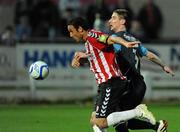 22 April 2011; Eamon Zayed, Derry City, in action against Ian Bermingham, St Patrick's Athletic. Airtricity League Premier Division, Derry City v St Patrick's Athletic, The Brandywell, Derry. Picture credit: Oliver McVeigh / SPORTSFILE