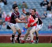 23 April 2011; Adrian Reid, Louth, in action against Paul Sharry, left, and Aidan Finnan, Westmeath. Allianz GAA Football Division 3 Final, Louth v Westmeath, Croke Park, Dublin. Picture credit: Ray McManus / SPORTSFILE