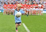 24 April 2011; Dublin mascot Josh Spratt, aged 6, practices his skills as the Cork team have their official team picture taken. Allianz Football League Division 1 Final, Dublin v Cork, Croke Park, Dublin. Picture credit: David Maher / SPORTSFILE