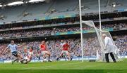 24 April 2011; Tomas Quinn, Dublin, beats Cork goalkeeper Ken O'Halloran to score his side's first goal. Allianz Football League Division 1 Final, Dublin v Cork, Croke Park, Dublin. Picture credit: David Maher / SPORTSFILE