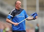 24 April 2011; Dublin manager Pat Gilroy holds a sideline flag shortly before half time. Allianz Football League Division 1 Final, Dublin v Cork, Croke Park, Dublin. Picture credit: David Maher / SPORTSFILE