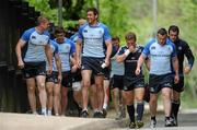 25 April 2011; Leinster's Jamie Heaslip, left, shares a joke with Nathan Hines, centre, on their way to squad training ahead of their Heineken Cup Semi Final against Toulouse on Saturday. Leinster Rugby Squad Training and Media Briefing, UCD, Belfield, Dublin. Picture credit: Barry Cregg / SPORTSFILE