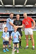 24 April 2011; Cork captain Michael Shields, right, with Dublin captain Bryan Cullen, referee Joe McQuillan and mascots Jamie whelan, left, age 5 and Josh Spratt, age 6, both from Donabate, Co. Dublin. Allianz Football League Division 1 Final, Dublin v Cork, Croke Park, Dublin. Picture credit: David Maher / SPORTSFILE