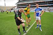 24 April 2011; Referee Marty Duffy, with captains, Michael Murphy, Donegal, and Colm Begley, Laois. Allianz Football League Division 2 Final, Donegal v Laois, Croke Park, Dublin. Picture credit: David Maher / SPORTSFILE