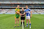 24 April 2011; Donegal captain Michael Murphy and Laois captain Colm Begley, right, shake hands in the presence of referee Marty Duffy ahead of the game. Allianz Football League Division 2 Final, Donegal v Laois, Croke Park, Dublin. Picture credit: David Maher / SPORTSFILE