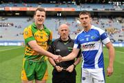 24 April 2011; Donegal captain Michael Murphy and Laois captain Colm Begley, right, shake hands in the presence of referee Marty Duffy ahead of the game. Allianz Football League Division 2 Final, Donegal v Laois, Croke Park, Dublin. Picture credit: David Maher / SPORTSFILE