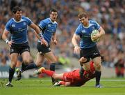 30 April 2011; Gordon D'Arcy, Leinster, supported by team-mates Shane Horgan, left, and Jonathan Sexton is tackled by David Skrela, Toulouse. Heineken Cup Semi-Final, Leinster v Toulouse, Aviva Stadium, Lansdowne Road, Dublin. Picture credit: Stephen McCarthy / SPORTSFILE