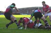 5 January 2002; Jason Holland of Munster goes over for his try during the Heineken Cup Pool 4 Round 5 match between Munster and Harlequins at Thomond Park in Limerick. Photo by Matt Browne/Sportsfile