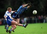 6 January 2002; Colin Moran of Dublin in action against Robbie Lambe of Blue Stars during the 2002 Football Blue Stars Exibition Game between Blue Stars and Dublin at Thomas Davis GAA Club in Tallaght, Dublin. Photo by Brian Lawless/Sportsfile