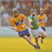 30 April 2011; Patrick Donnellan, Clare, in action against Graeme Mulcahy, Limerick. Allianz Hurling League Division 2 Final, Clare v Limerick, Cusack Park, Ennis, Co. Clare. Picture credit: David Maher / SPORTSFILE