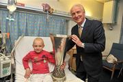 4 May 2011; Republic of Ireland manager Giovanni Trapattoni and Mia Keane, age 7, from Malahide, Co. Dublin, with the UEFA Europa League Trophy during a visit to the Oncology Unit in Crumlin Children’s Hospital. Our Lady's Children's Hospital, Crumlin, Dublin. Picture credit: David Maher / SPORTSFILE