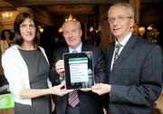 5 May 2011; The Irish Sports Council launched a new, free, iPhone App, at the announcement of details of their  2010 Anti-Doping Report. The App will allow athletes check all medications against the WADA Prohibited List. The Med Check accesses the Eirpharm Drugs in Sport Database which will indicate if a substance is prohibited, a resources for everyone involved in sport. At the announcement is Michael Ring T.D., Minister of State at the Department of Transport, Tourism and Sport with John Treacy, CEO of the Irish Sports Council, right, and Dr Úna May, Director of Anti-Doping. Buswells Hotel, Molesworth Street, Dublin. Picture credit: Brian Lawless / SPORTSFILE