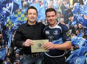 6 May 2011; Leinster's Fergus McFadden is presented with the Man of the Match by Adam Chamberlain, Head of Sales and Marketing, Volkswagen Ireland, after the game. Celtic League, Leinster v Glasgow Warriors, RDS, Ballsbridge, Dublin. Picture credit: Stephen McCarthy / SPORTSFILE