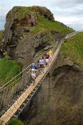 11 May 2011; At the launch of the 2011 GAA Hurling All-Ireland Senior Championship on the Carrick-a-Rede Rope Bridge in Co. Antrim are, from left, Páraic Maher, Tipperary, Tomás Brady, Dublin, Cyril Donnellan, Galway, and Neil McManus, Antrim. Launch of 2011 GAA Hurling All-Ireland Senior Championship, Dunloy, Co. Antrim. Picture credit: Ray McManus / SPORTSFILE