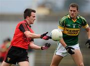 10 April 2011; Mark Poland, Down, in action against Eoin Brosnan, Kerry. Allianz Football League, Division 1, Round 7, Kerry v Down, Fitzgerald Stadium, Killarney, Co. Kerry. Picture credit: Brendan Moran / SPORTSFILE