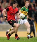 10 April 2011; Martin Clarke, Down, in action against Colm Cooper, Kerry. Allianz Football League, Division 1, Round 7, Kerry v Down, Fitzgerald Stadium, Killarney, Co. Kerry. Picture credit: Brendan Moran / SPORTSFILE