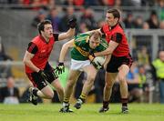 10 April 2011; Darran O'Sullivan, Kerry, in action against Kevin McKernan, left, and Daniel Hughes, Down. Allianz Football League, Division 1, Round 7, Kerry v Down, Fitzgerald Stadium, Killarney, Co. Kerry. Picture credit: Brendan Moran / SPORTSFILE