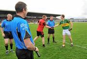 10 April 2011; Team captains Brendan Coulter, Down, and Colm Cooper, Kerry, shake hands under the watchful eye of match referee Rory Hickey. Allianz Football League, Division 1, Round 7, Kerry v Down, Fitzgerald Stadium, Killarney, Co. Kerry. Picture credit: Brendan Moran / SPORTSFILE