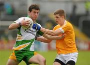 15 May 2011; Patrick McBrearty, Donegal, in action against Conor Hamill, Antrim. Ulster GAA Football Minor Championship, Donegal v Antrim, MacCumhail Park, Ballybofey, Co. Donegal. Picture credit: Oliver McVeigh / SPORTSFILE