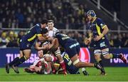 18 December 2016; Clive Ross of Ulster is tackled by Ludovic Radosavljevic, left, and Viktor Kolelishvili of ASM Clermont Auvergne during the European Rugby Champions Cup Pool 5 Round 4 match between ASM Clermont Auvergne and Ulster at Stade Marcel-Michelin in Clermont-Ferrand, France. Photo by Ramsey Cardy/Sportsfile